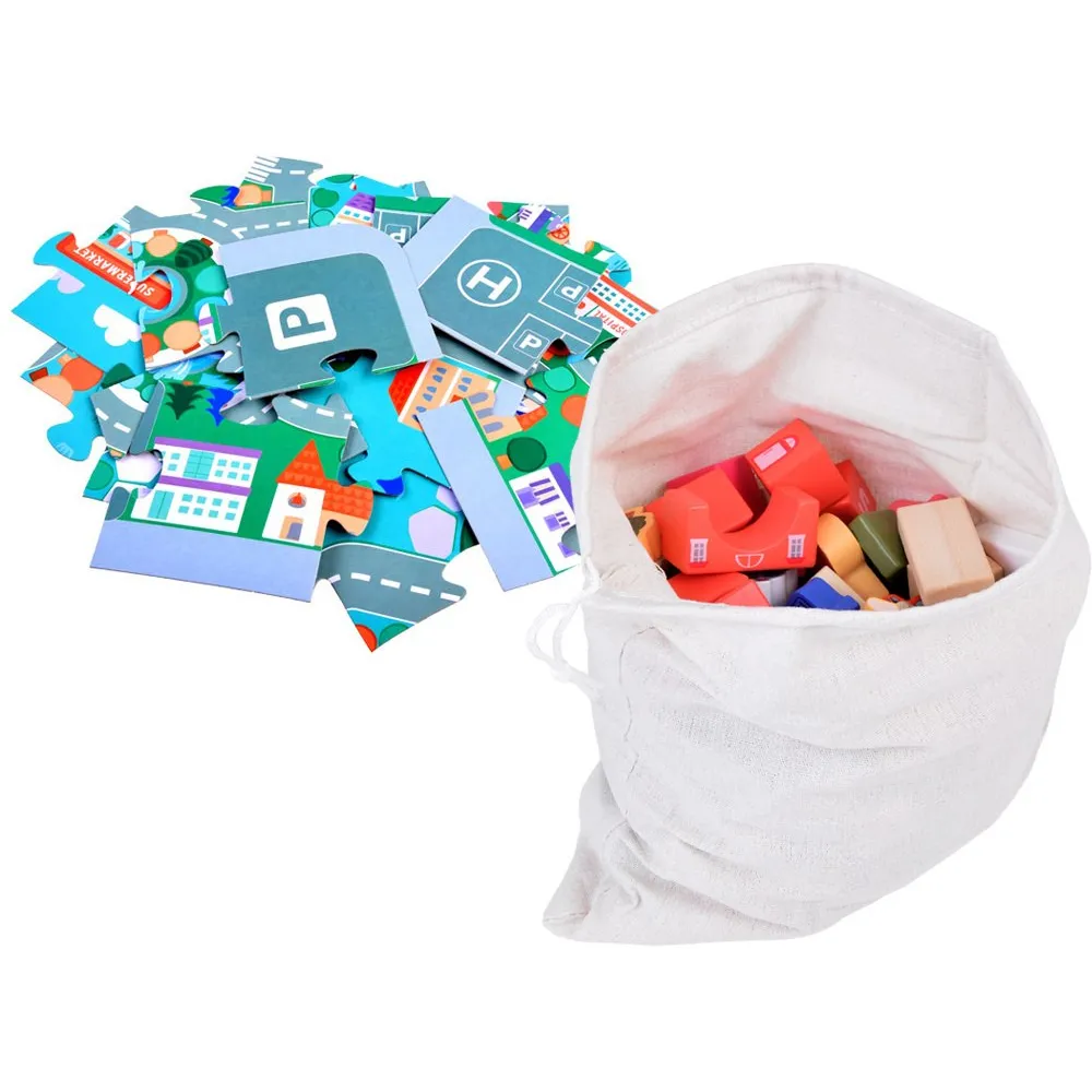 pojazdy z ruchomymi kołami ustawione na planszy miasteczka