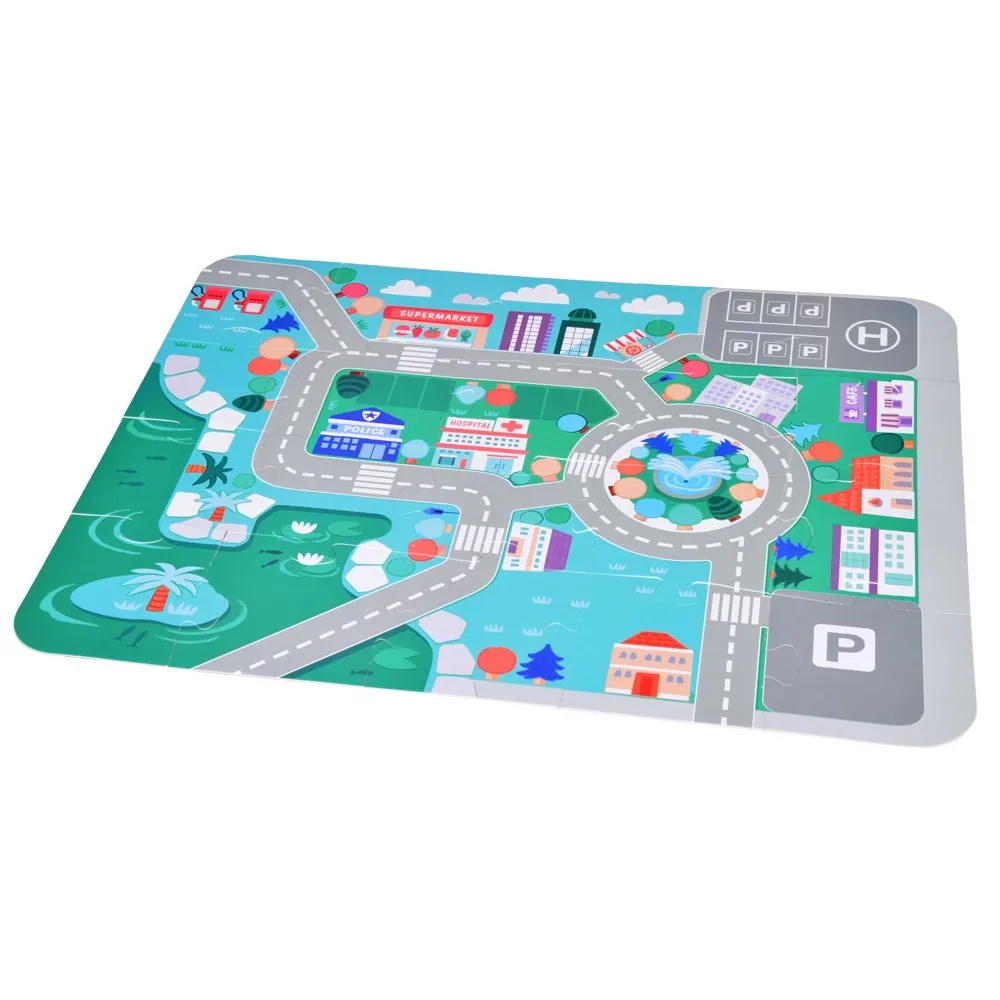 duża mata z puzzli przedstawiająca ulice i roślinność miasteczka