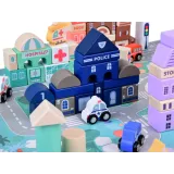 klocki o różnych kształtach budynków rozłożone na planszy