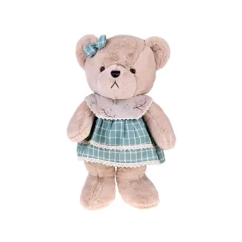 miś z zieloną kokardką w białą kratkę na głowie