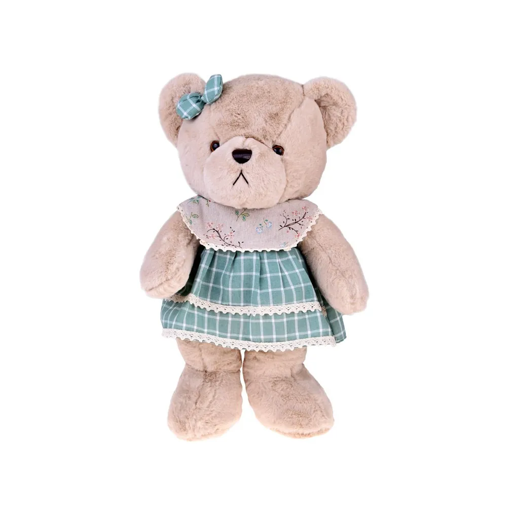 miś z zieloną kokardką w białą kratkę na głowie