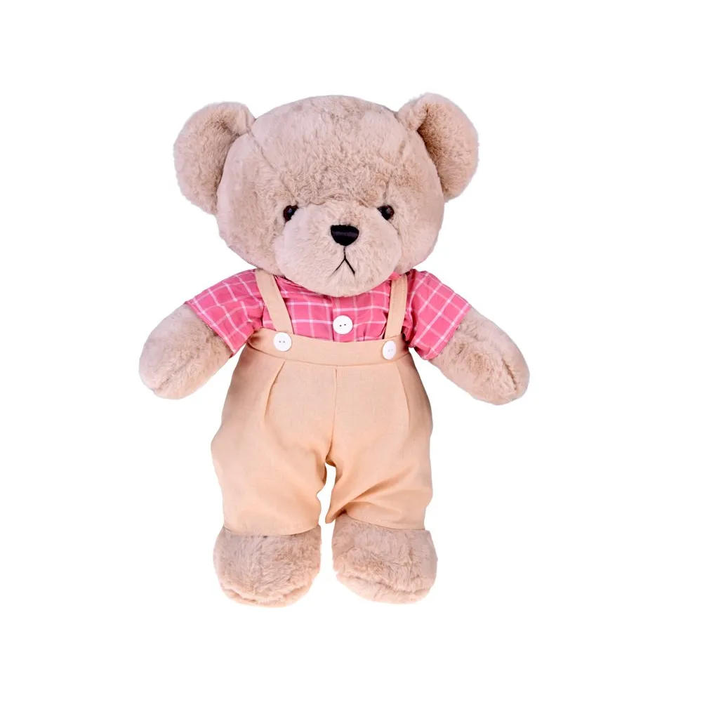 zbliżenie na twarz beżowego misia filip z brązowym nosem