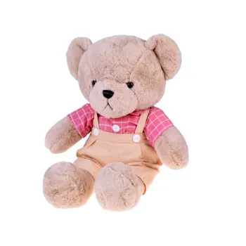 beżowy miś filip stojący jako dekoracja dziecięcego pokoju