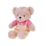 beżowy miś filip stojący jako dekoracja dziecięcego pokoju