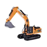 Koparka samochód ZA5012 na tle piaskownicy z podniesioną łyżką