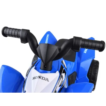 Dziecięcy quad HONDA ATV prezentowany w domu i na zewnątrz