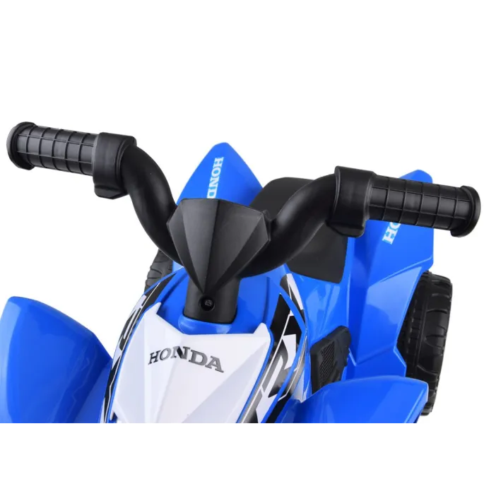 Dziecięcy quad HONDA ATV prezentowany w domu i na zewnątrz