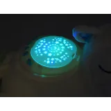 zbliżenie na wyszywane detale pyszczka i oczu owieczki