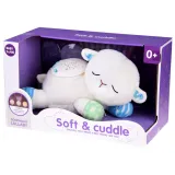 owca pluszak leżąca w dziecięcym łóżeczku