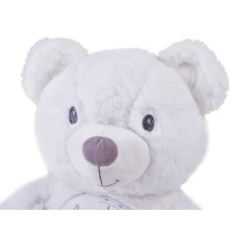 projektor wyświetlający kolorowe gwiazdy i księżyce na ścianie