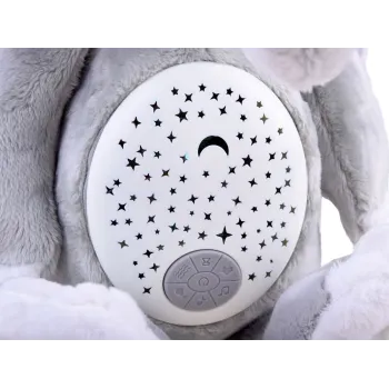 szary pluszowy słonik siedzący z widocznymi konstelacjami na brzuszku