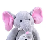 ułożony na łóżku pluszowy słonik jako lampka nocna