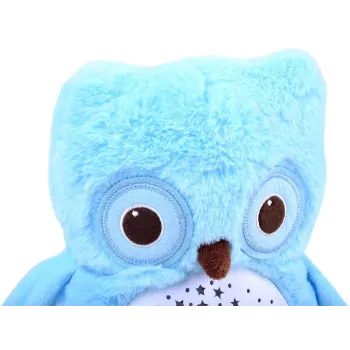 Projektor sowa w dłoni dziecka z widocznymi przyciskami sterowania