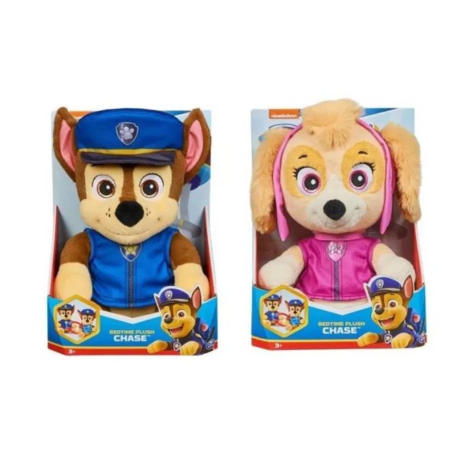 Przytulanka Psi Patrol Chase w dwustronnym stroju na tle poduszki