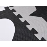 zbliżenie na stonowane kolory puzzli piankowych w grafitach i szarościach