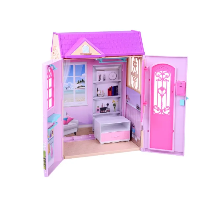 domek zamknięty w formie walizki z uchwytem do przenoszenia