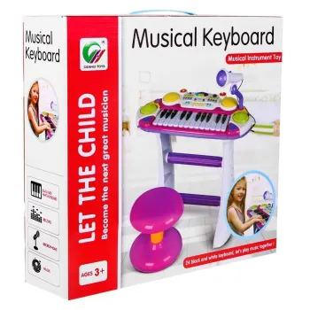 Opakowanie zestawu muzycznego dla dzieci z widoczną grafiką keyboardu