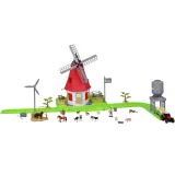 figurka gospodarza z akcesoriami ustawiona przy wejściu do budynku młyna