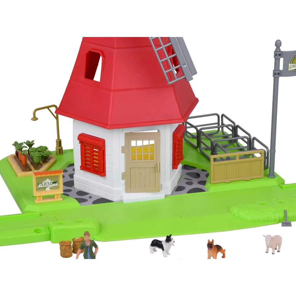 widok na rozłożone elementy zestawu do budowy krajobrazu wiejskiego