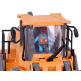 spychacz rc z widocznym ruchomym ramieniem podczas zabawy