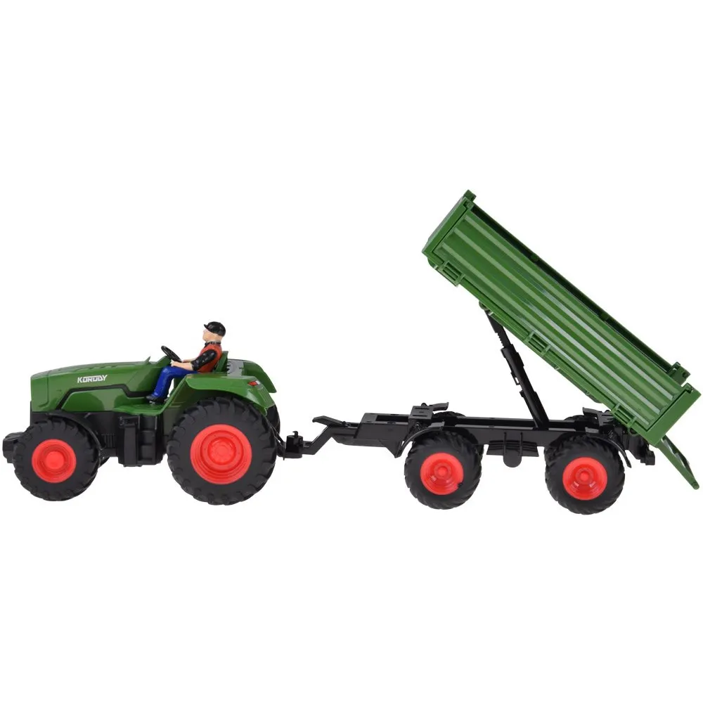 Traktor z włączonym oświetleniem LED podczas jazdy