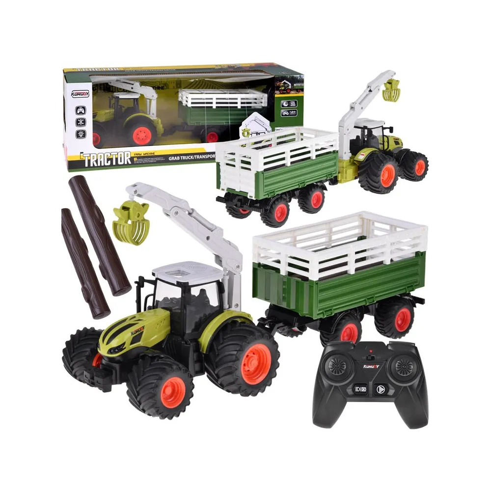 Traktor na pilota z przyczepą i chwytakiem podczas zabawy