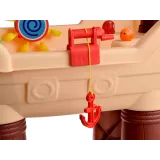 kolorowe foremki do piasku na tle zestawu placu zabaw