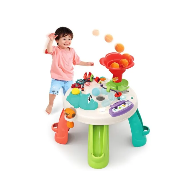 Kolorowe kulki umieszczone na torze spiralnym interaktywnej zabawki