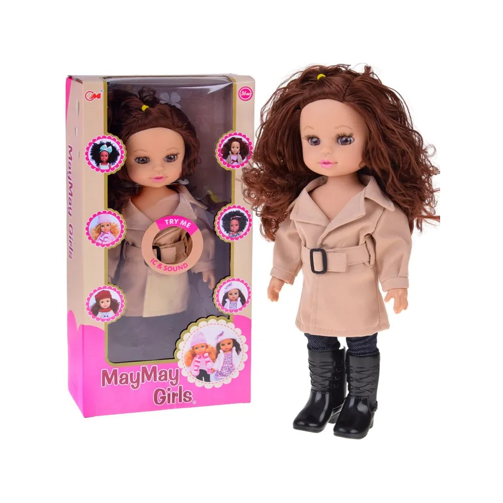 Kalinka Jesieniara w karmelowym płaszczyku i legginsach stojąca pod światło