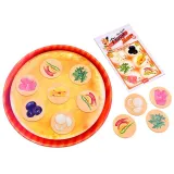 zbliżenie na żetony składników do układania pizzy