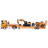 Tir z odpinaną lawetą podczas transportu maszyn budowlanych