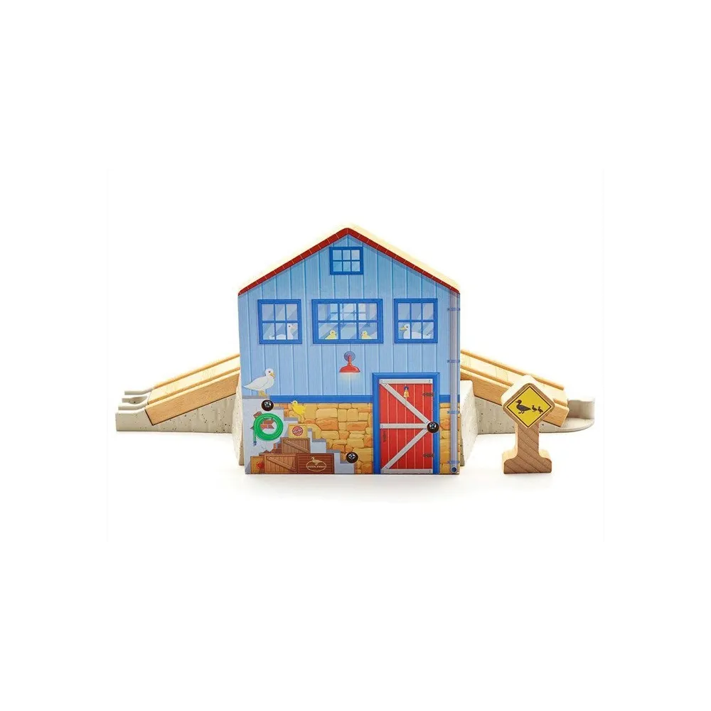 Detal na figurce kaczuszki poruszającej się od farmy do sadzawki