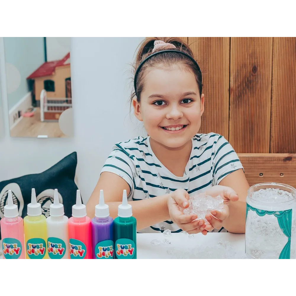 Zbliżenie na instrukcję i wybrane narzędzia do zabawy Tubi Jelly