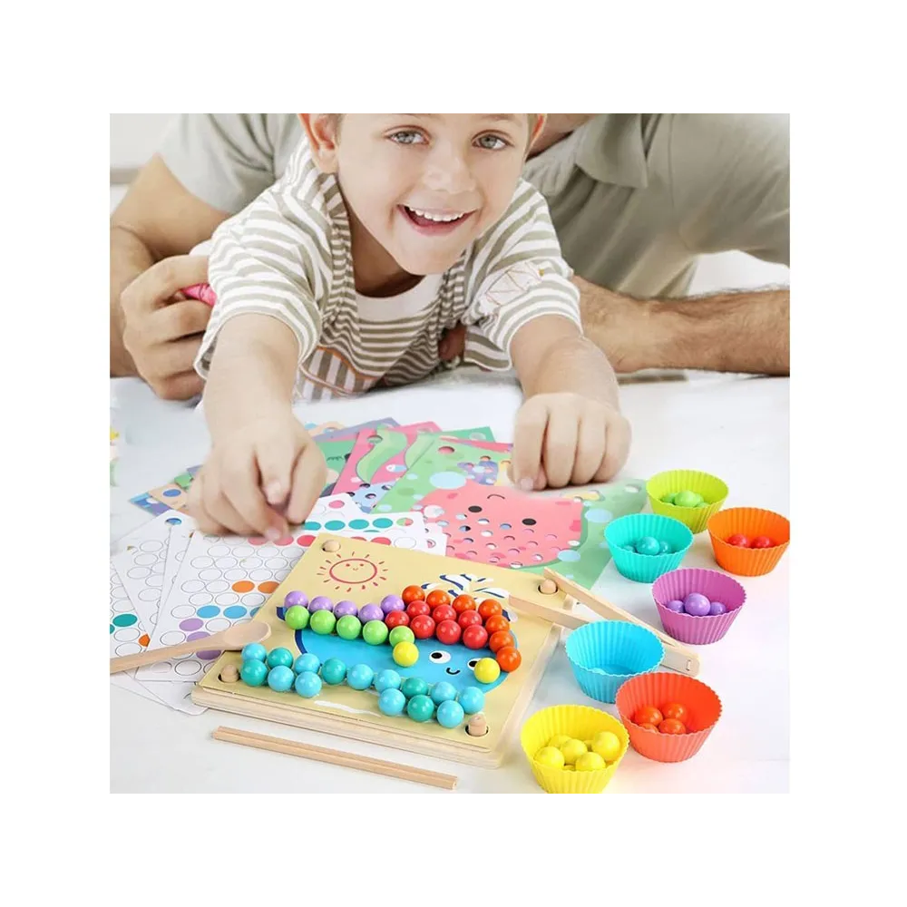 Komplet elementów układanki: panel, kulki, miseczki, narzędzia i szablony