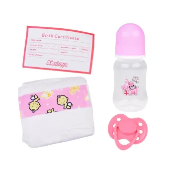 akcesoria: pampers, butelka oraz magnetyczny smoczek przy lalce