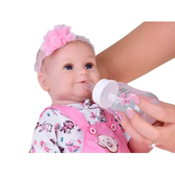 biała skarpetka z falbanką na nodze lalki bobas