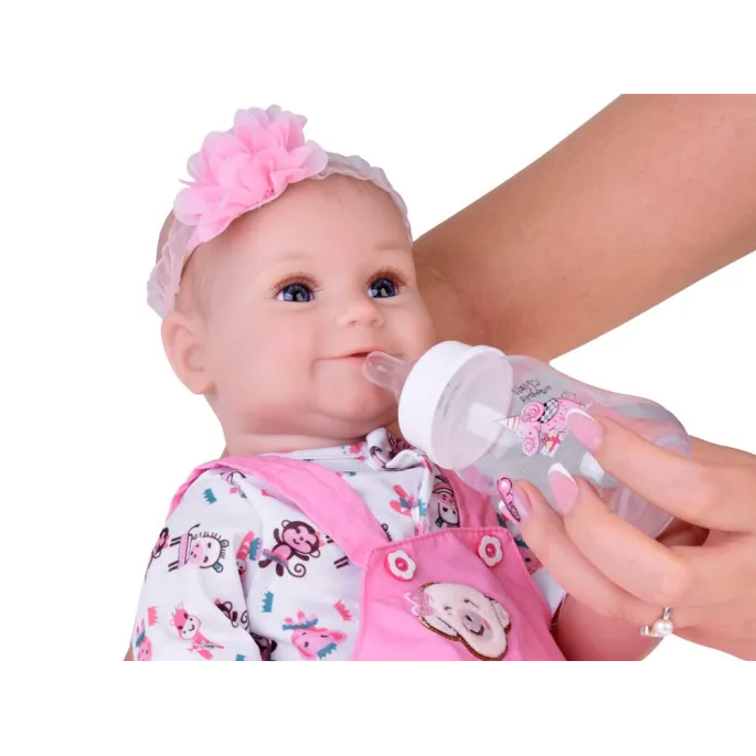 biała skarpetka z falbanką na nodze lalki bobas