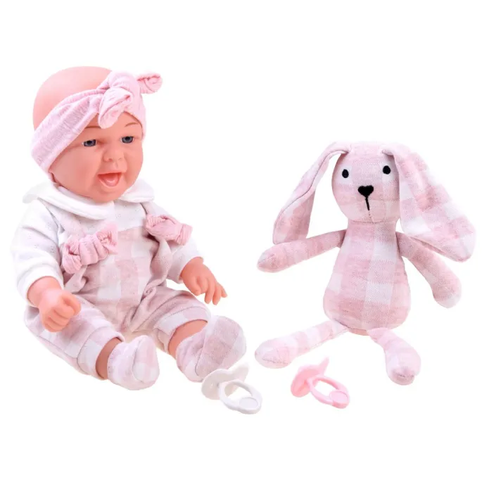 zbliżenie na pluszowego króliczka z wyszywanymi oczkami