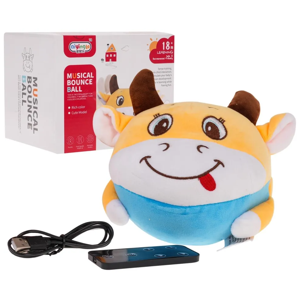 kompletny zestaw: krowa, pilot i kabel usb na białym tle