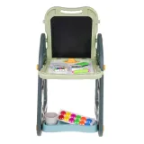 tablica ustawiona jak stoliczek z półeczkami na przybory