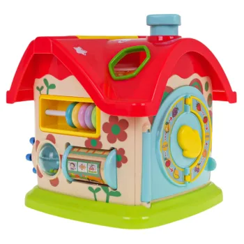 Czerwony dach domku z otworami do sortowania klocków