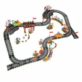 dwa świecące pojazdy na torze magnetycznym w trakcie wyścigu