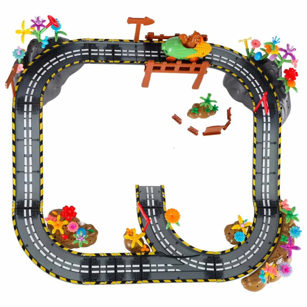 153 elementy zestawu rozłożone na stole do budowy toru