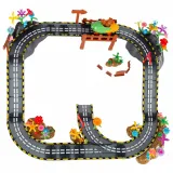 153 elementy zestawu rozłożone na stole do budowy toru