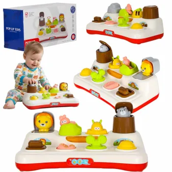 Zabawka pop-up z wyskakującymi zwierzątkami na kolorowej tablicy