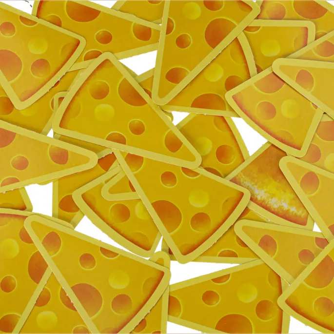 dziecko wyciąga kawałek sera z pułapki