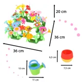 aranżacja ogrodu kwiatowego z klocków na podłodze