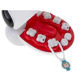 pastę do zębów i kubeczek jako elementy zestawu