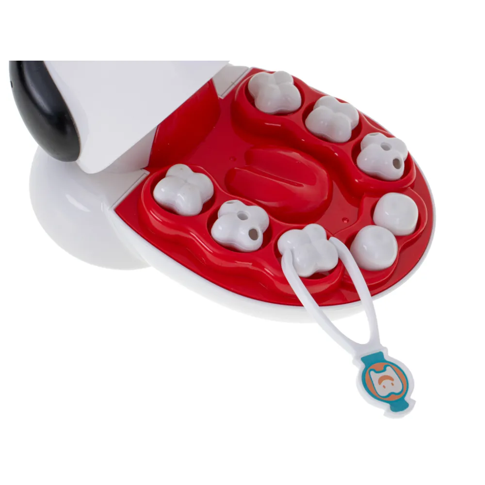 pastę do zębów i kubeczek jako elementy zestawu