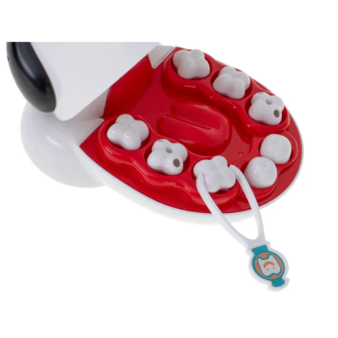 pastę do zębów i kubeczek jako elementy zestawu